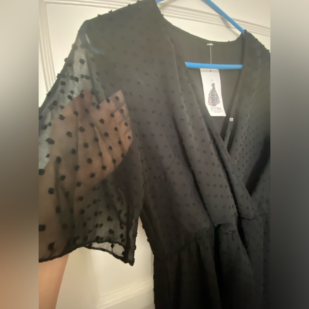 Black lightweight black dress size medium. NWT.